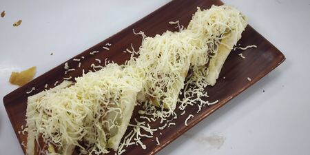 A cheese bread sandwich with tomato Ketchup.の写真素材