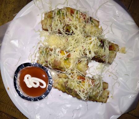 A cheese bread sandwich with tomato Ketchup.の写真素材