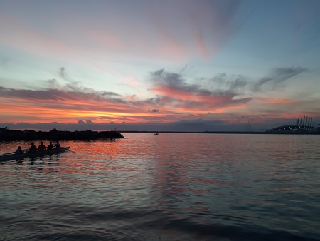 An amazing caption of small waves and beautiful sunset with an incredible reflection over the sea...