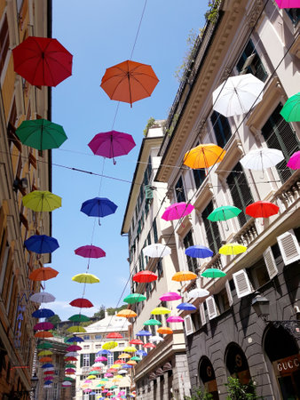 Genoa, Italy - 04/06/2019: Rainbow gay pride protection symbol in hanging umbrellas over the cityのeditorial素材