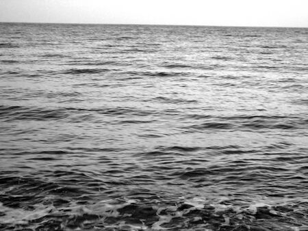 Sunset horizon sea water landscape. Sunset sea horizon panorama. Orange sunset sea horizon view at sunsetの写真素材