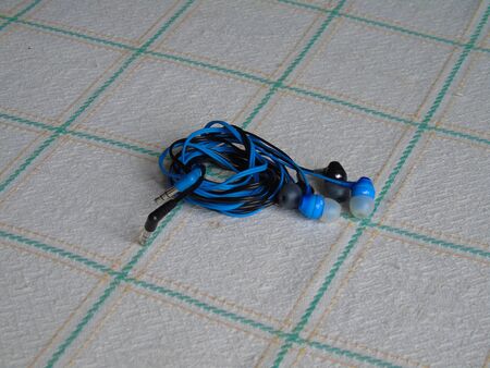 Head phones with grey background.
