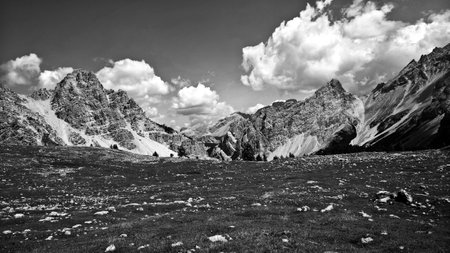 Trentino Alto - Adige, Italy - 06/15/2020: cenic alpine place with magical Dolomites mountains in the background, amazing clouds and blue sky in Trentino Alto Adige region, Italy, Europeのeditorial素材