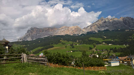 Val Gardena, Italy - 09/15/2020: Scenic alpine place with magical Dolomites mountains in background, amazing clouds and blue sky in Trentino Alto Adige region, Italy, Europeの写真素材