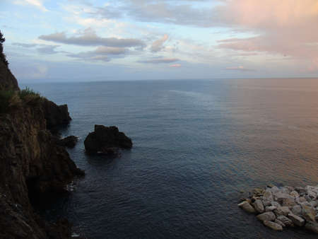 Genova, Italy - February, 09, 2021: An amazing caption of the sunset in winter days over the sea of...