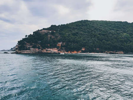 Seascape, blue sky, clouds and sea in the tropical waters of the Mediterranean sea in winter days.