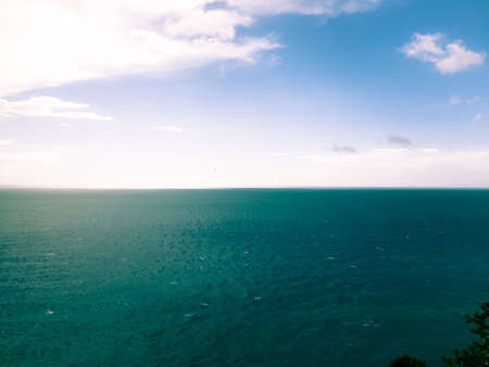 Seascape, blue sky, clouds and sea in the tropical waters of the Mediterranean sea in winter days.