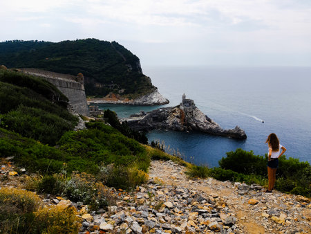 Liguria, Italy - June 15, 2020: Traveling around the ligurian seaside. Panoramic view to the seaside and the old villages. An amazing caption of the medieval colored houses with gray sky.のeditorial素材