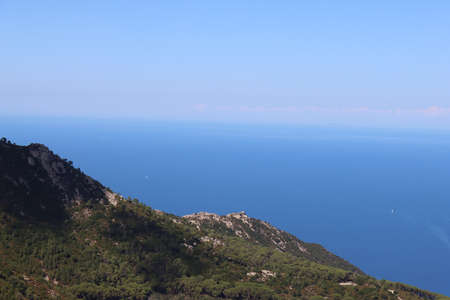 beautiful places from Elba Island. Aerial view to the island. Little famous villages near the beaches. Summer tourist places. Clouds and blue sky in the background.の写真素材