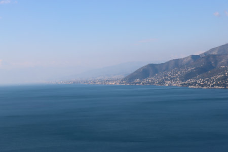 Landscape of the Mediterranean Sea with mountains in the background, Italyの写真素材