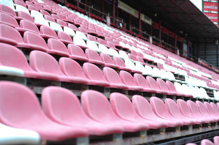 row of chair in football stadiumの写真素材