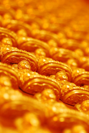 the gold buddha image in thailandの写真素材