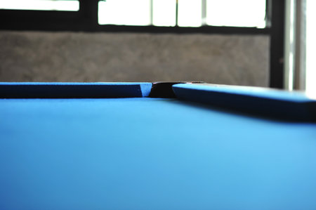 the Background of blue woolen fabric flannel felt snooker table and holeの写真素材