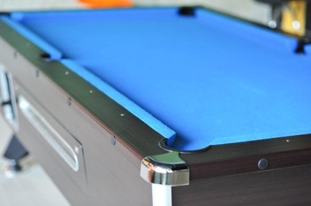 the Background of blue woolen fabric flannel felt snooker table and holeの写真素材