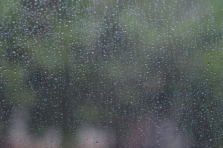 the focus on water surface in rain seasonの写真素材