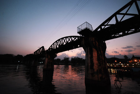 the the wolrd war two bridge over river kwae in kanchanaburi thailand evening sunset blue sky so beautiful landscapeの写真素材