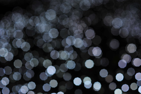 Blur focus of light on black background from lamp in night on Christmas before new year 2018 so beautiful romantic holidayの写真素材
