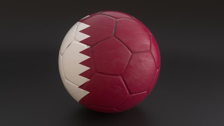 Qatar flag embedded in a soccer ball on gray backgroundの写真素材