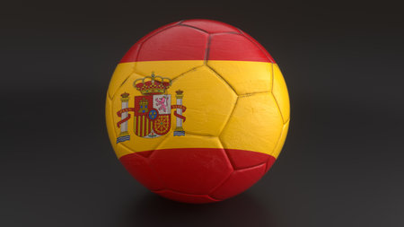Spain flag embedded in a soccer ball on gray backgroundの写真素材