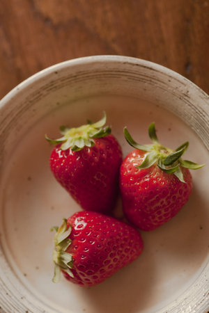 strawberry on the old wood table, macroの写真素材