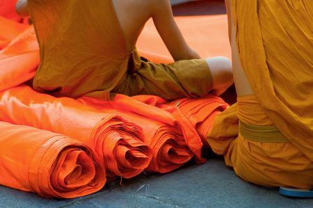 monks sitting on robesの写真素材