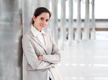 Portrait young Caucasian businesswoman, smart employee, wear suit and cross arm with copy spaceの写真素材