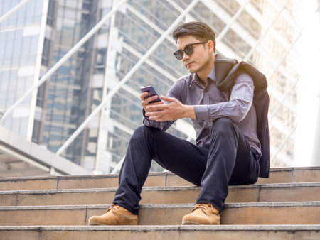 Portrait young asian businessman in the city, businessman, manager, boss handsome looking in the city concept.の写真素材