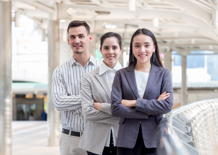 Group of young caucasian business people in the city with successful and confident feelingの写真素材