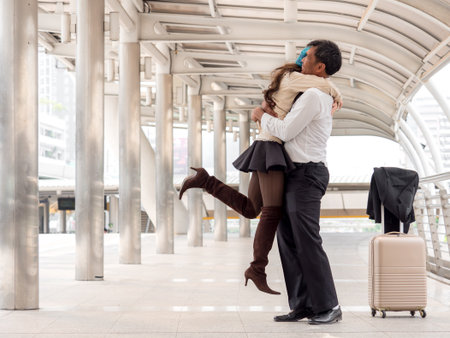 Woman traveler holding bag, luggage, suitcase in the airport during traveling,
travel, trip for woman concept, say hi, good bye to friendの写真素材