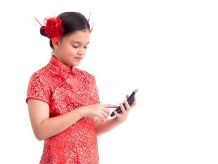 Chinese new year woman concept, isolated a girl wearing red dress Cheongsam holding calculatorの写真素材