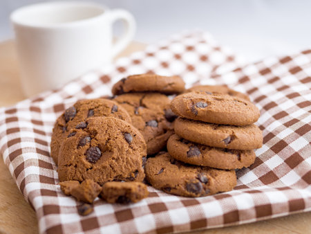 Chocolate cookies on a scott fabric napkin in a dishの写真素材