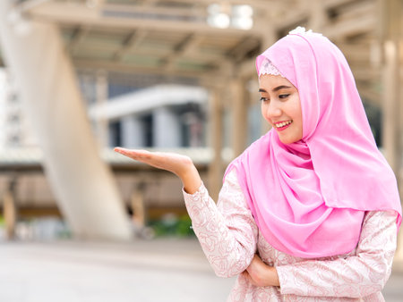 Portrait of young beautiful arabian woman, businesswoman in the city, Professional, smart and confidential businesswoman conceptの写真素材