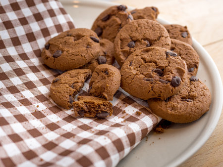 Chocolate cookies on a scott fabric napkin in a dishの写真素材