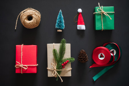 Christmas background with composition of christmas decoration over black background. flatlay topviewの写真素材