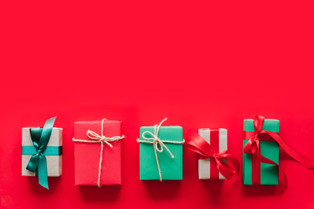 Gift/presents box over red background for chirstmas and happy new year concept with copy space. topview flatlayの写真素材
