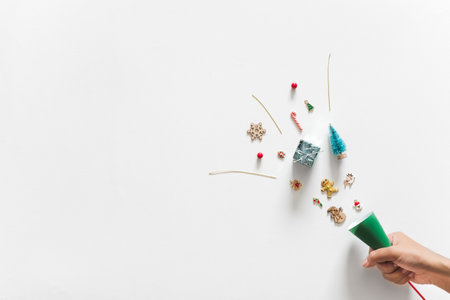 Party popper with chrsitmas decoration isolated over white background for happy new year celebration concept. topview flatlay and copy spaceの写真素材