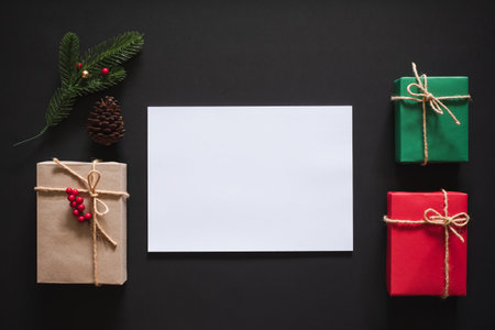 Christmas background with blank empty copy space white box for text with gift box, present over black background. flatlay topviewの写真素材