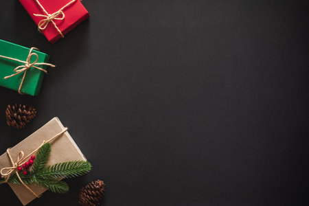 Christmas background with gift present over black background with copy space. flatlay topviewの写真素材