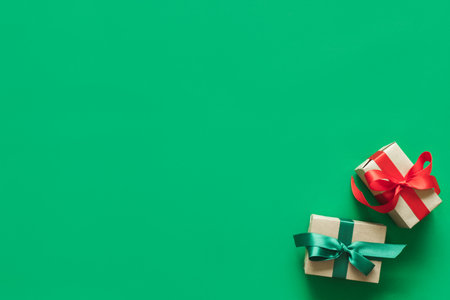 Christmas background with gift present over green background with copy space. flatlay topviewの写真素材