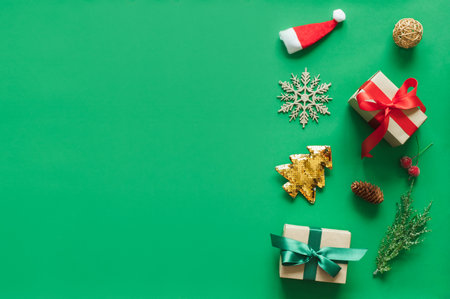Christmas background with gift present over green background with copy space. flatlay topviewの写真素材