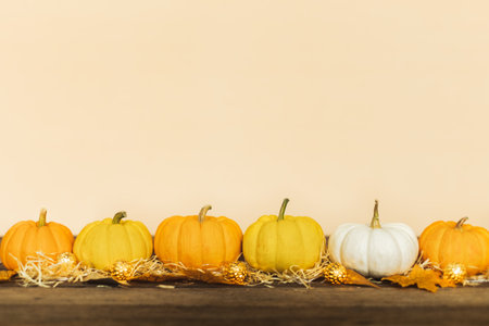 Thanksgiving background, pumpkin, leaves and decoration on wood table background with copy space. flatlayの写真素材