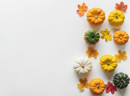 Thanksgiving background, pumpkin, leaves and decoration on white background with copy space. flatlayの写真素材