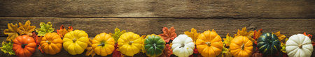 Thanksgiving background, pumpkin, leaves and decoration on wood table background with copy space. flatlayの写真素材