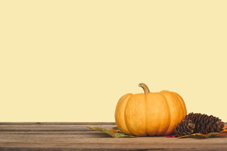 Thanksgiving background, pumpkin, leaves and decoration on wood table background with copy space. flatlayの写真素材