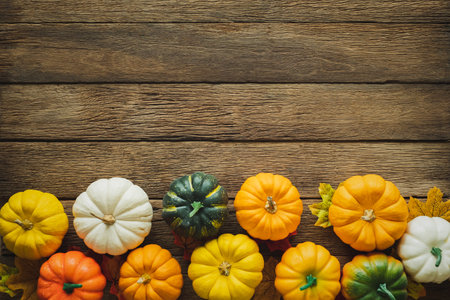 Thanksgiving background, pumpkin, leaves and decoration on wood table background with copy space. flatlayの写真素材