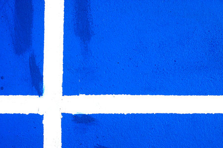 White line on blue courtの写真素材