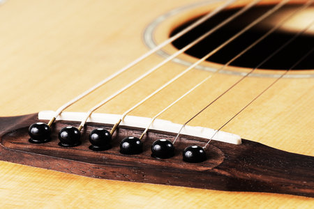 Close up of bridge pin and sound ,acoustic guitarの写真素材