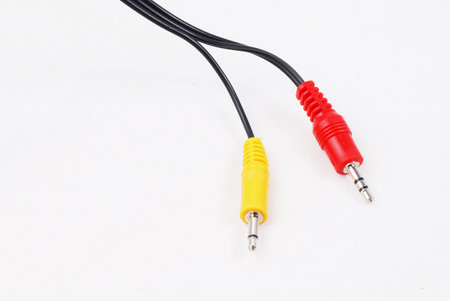 Red and yellow audio jacks on isolated white background