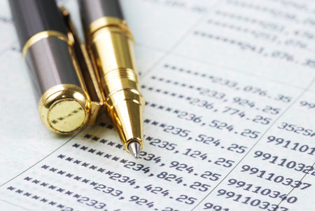 gold pen on bank account passbookの写真素材