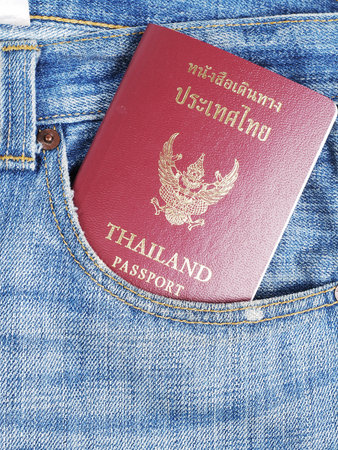 Thailand passport in jeans pocketの写真素材